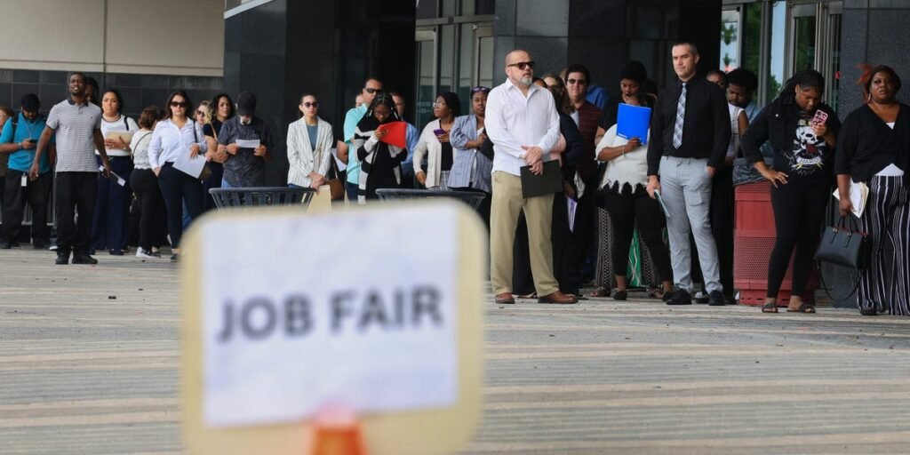 ‘Older, Experienced Workers’ Have Less Cause for Concern About AI: Dallas Fed