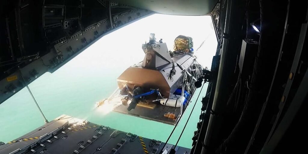 British Navy Hurling Drone Boats From Turboprop Plane at 1,300 Feet